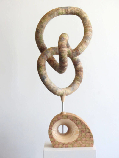 Pnoeud - François LACOSTE Sculpture en bois d'un pneu entremêlé